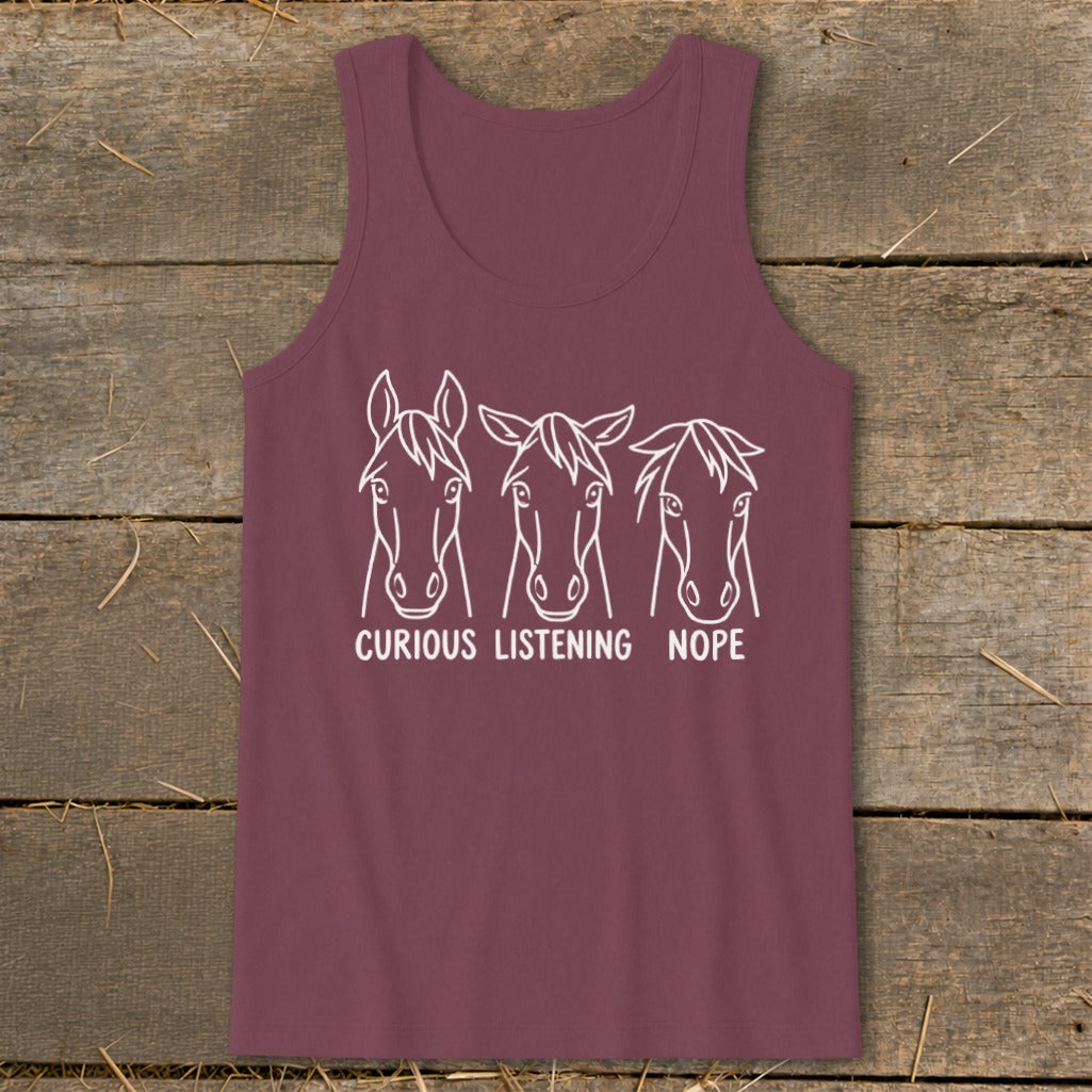 Maroon tank top featuring white line art of three horse heads with captions curious, listening, and nope.