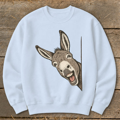 Light blue sweatshirt with a cartoon donkey peeking from the side.