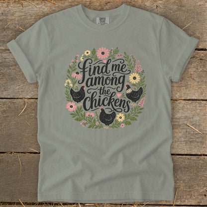 Grey t-shirt with floral wreath, chickens, and text "Find me among the chickens".