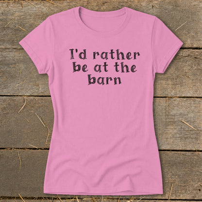 Pink t-shirt with black text reading "I'd rather be at the barn."