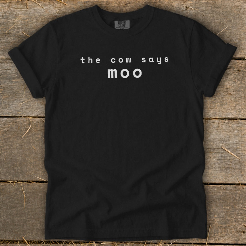 Black t-shirt with white text "the cow says moo".