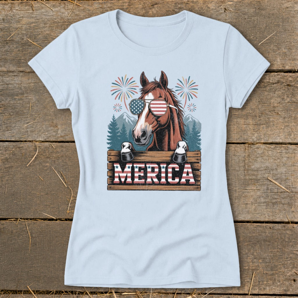 Horse wearing American flag sunglasses with "MERICA" text and fireworks.