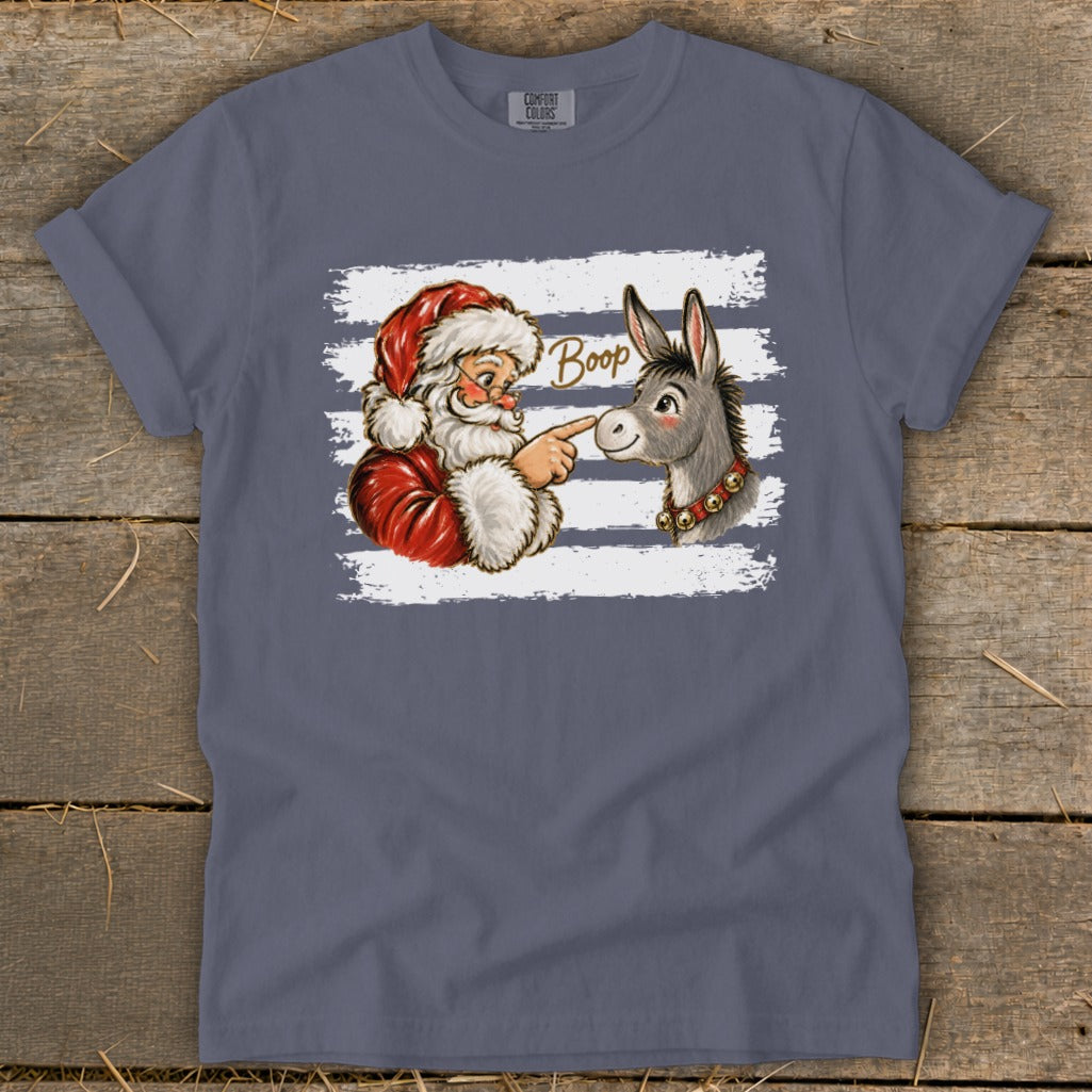 Santa booping a donkey with the word "Boop" written above.