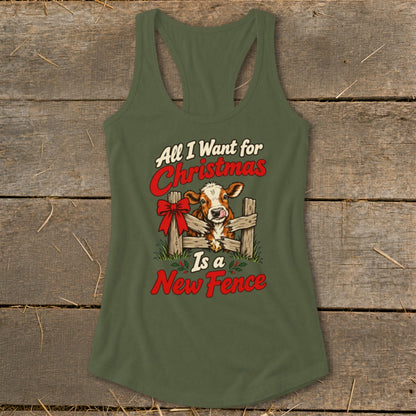 Green tank top with cow and Christmas fence graphic: "All I Want for Christmas Is a New Fence".