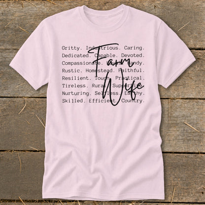 Pink t-shirt with "Farm Wife" text and descriptive words.