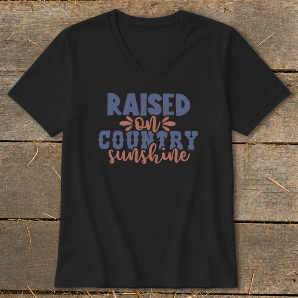 Black v-neck t-shirt with "Raised on country sunshine" text design.