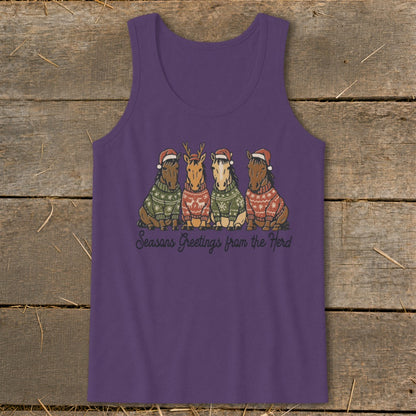 Four horses in festive sweaters and Santa hats with "Seasons Greetings from the Herd" text.