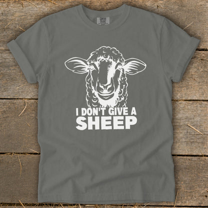 Grey t-shirt with white sheep graphic and text "I DON'T GIVE A SHEEP".