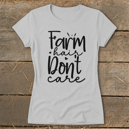Light grey t-shirt with black text "Farm hair Don't care".