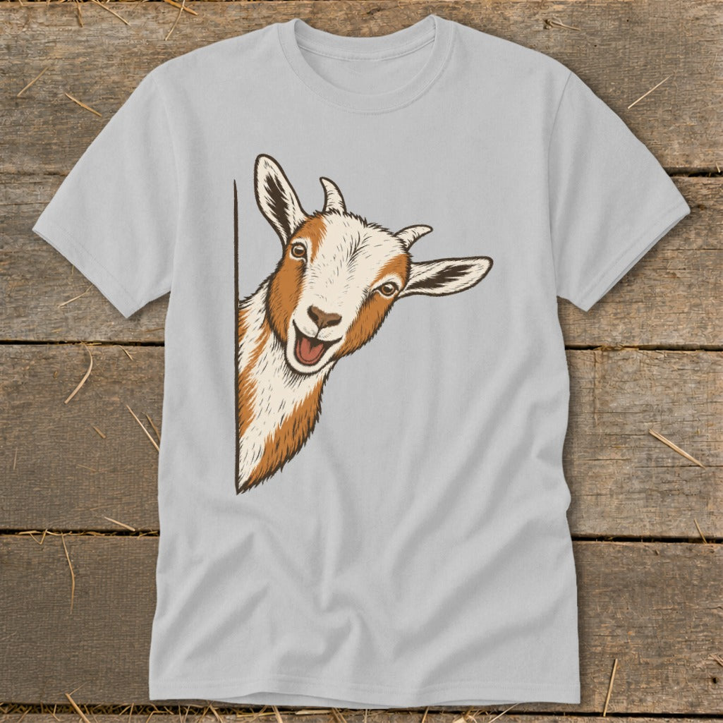 Illustration of a smiling goat peeking around a corner on a light gray t-shirt.