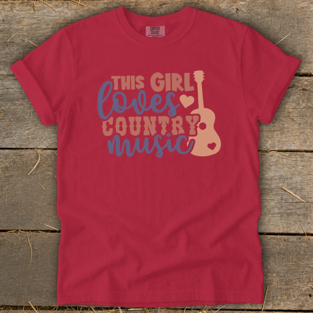 Red t-shirt with "This Girl Loves Country Music" text and guitar graphic.