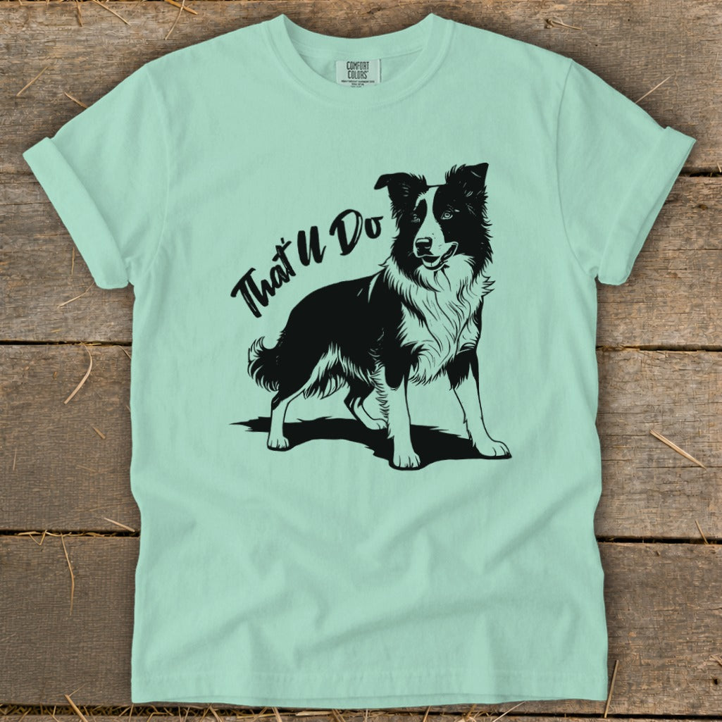 Black and white illustration of a Border Collie on a mint t-shirt with text "That'll Do".