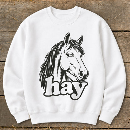 White sweatshirt with a black line drawing of a horse's head and the word "hay."