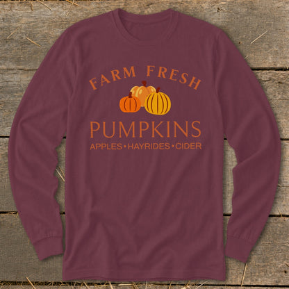 Burgundy long sleeve shirt with "Farm Fresh Pumpkins" and "Apples • Hayrides • Cider" text.