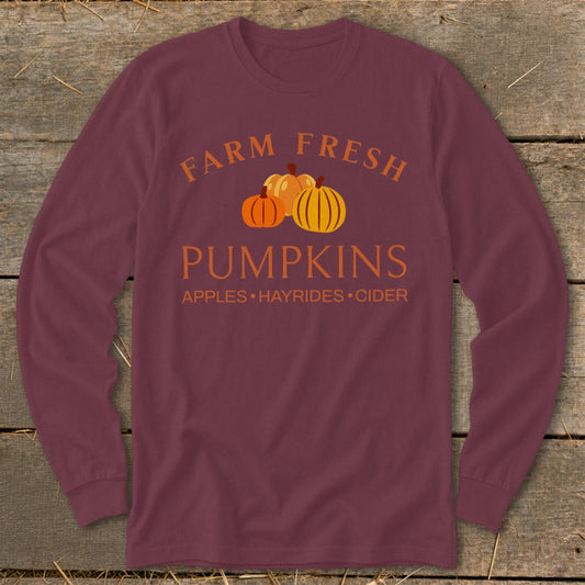 Burgundy long sleeve shirt with "Farm Fresh Pumpkins" and "Apples • Hayrides • Cider" text.