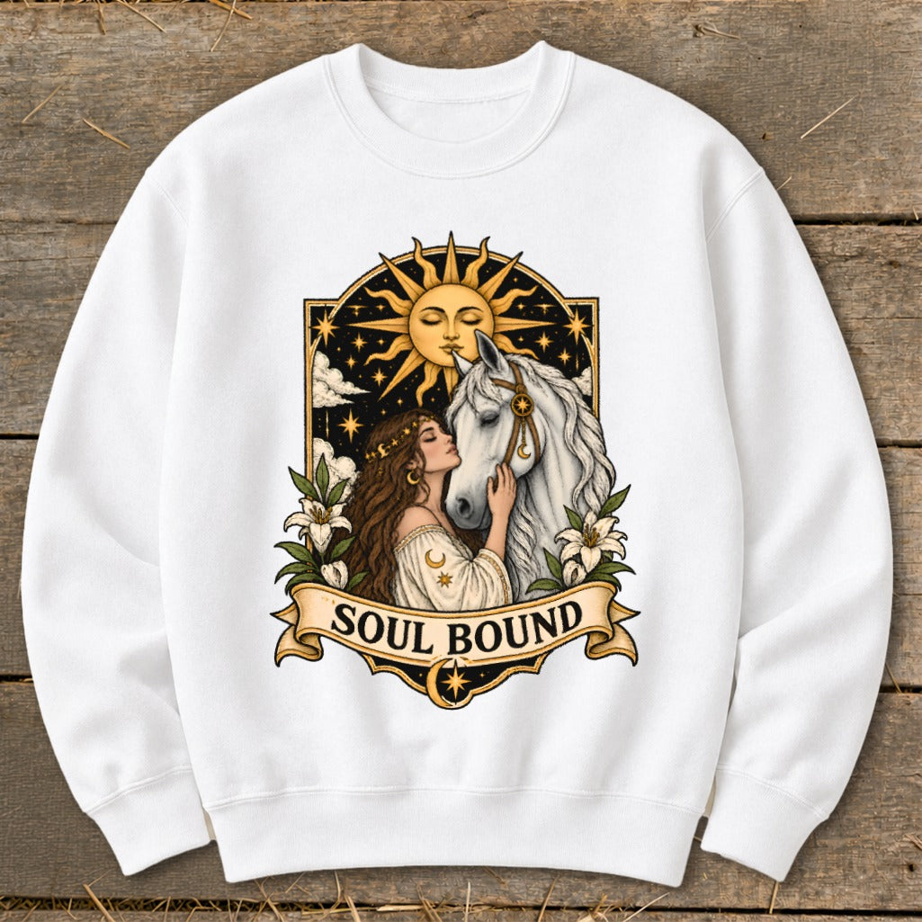 Woman with long hair nuzzles a white horse under a sun and stars, text "SOUL BOUND".