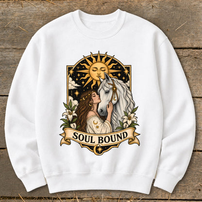 Woman with long hair nuzzles a white horse under a sun and stars, text "SOUL BOUND".