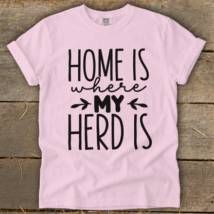 Light pink t-shirt with black text reading "HOME IS where MY HERD IS".