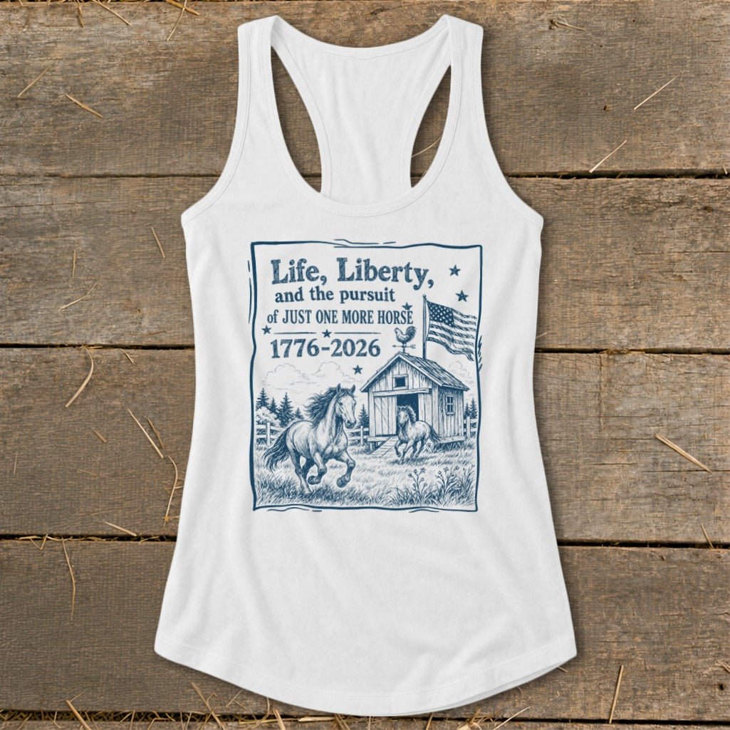 White tank top with "Life, Liberty, and the pursuit of JUST ONE MORE HORSE 1776-2026" graphic.