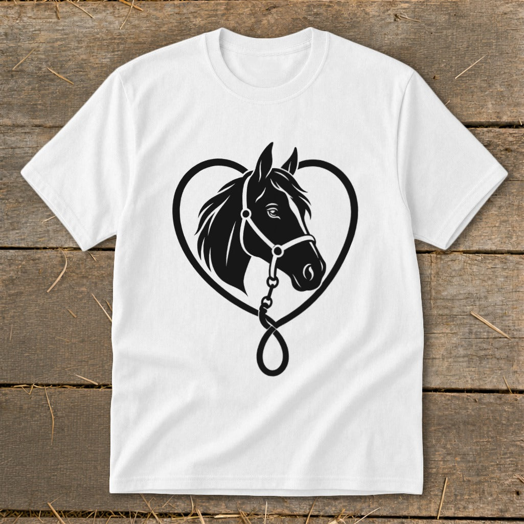 A white short-sleeved t-shirt featuring a black graphic of a horse's head framed by a heart shape on a wooden surface.