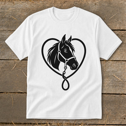 A white short-sleeved t-shirt featuring a black graphic of a horse's head framed by a heart shape on a wooden surface.