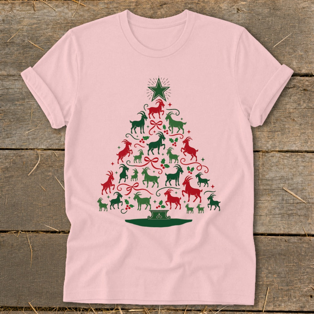 Pink t-shirt with a Christmas tree made of red and green goats and bows.