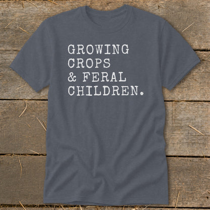 Grey t-shirt with white text: "GROWING CROPS & FERAL CHILDREN."