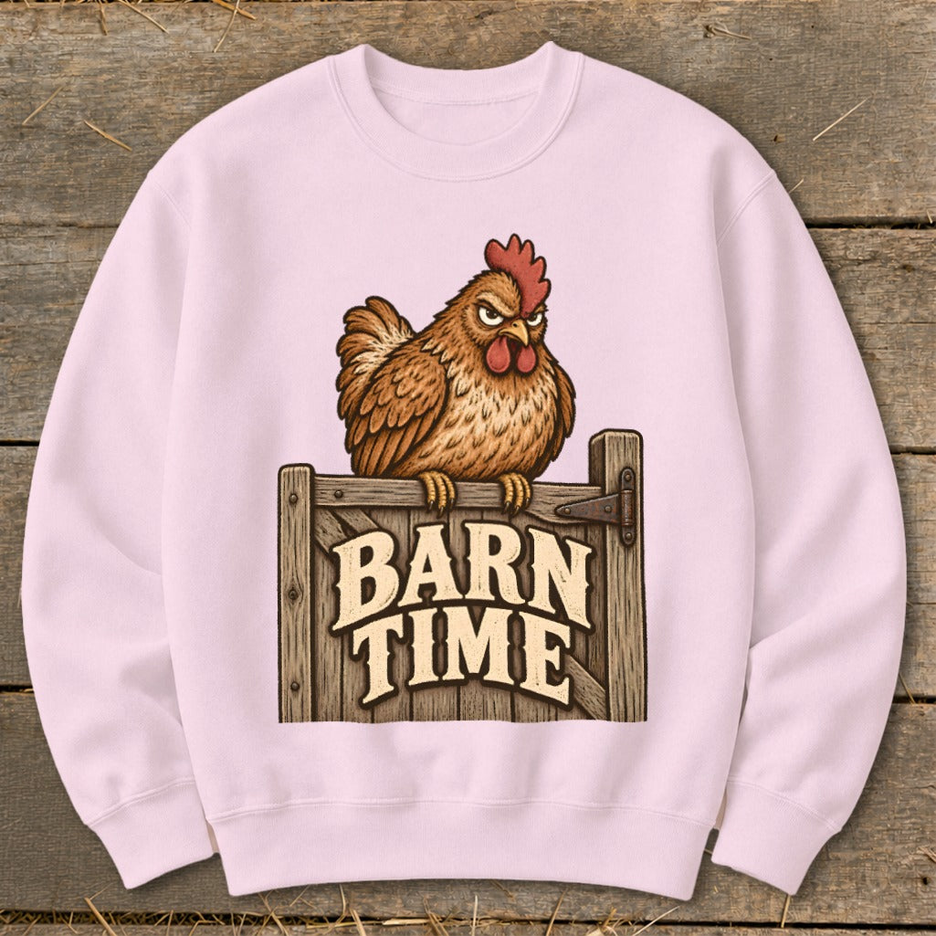 Pink sweatshirt with a grumpy chicken sitting on a wooden gate that says "BARN TIME".