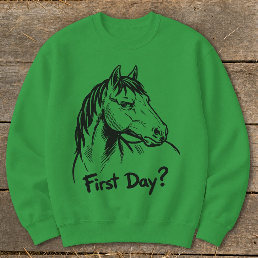Green sweatshirt with black horse head graphic and text "First Day?".