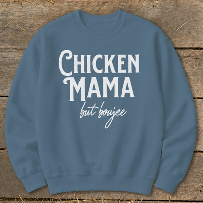Blue sweatshirt with white text that reads "Chicken Mama but boujee."