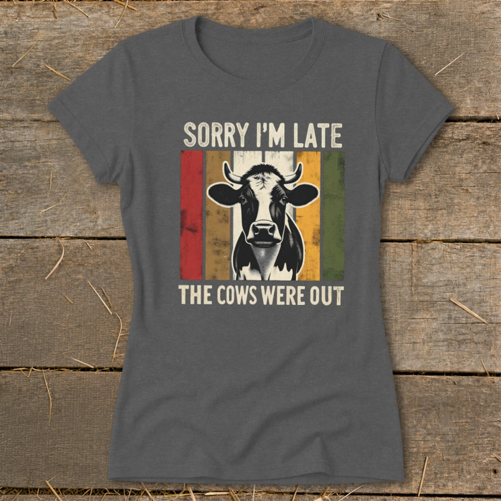 Graphic of a cow with text "Sorry I'm late, the cows were out."