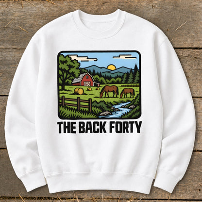 A white crewneck sweatshirt featuring a graphic of a rural farm scene and the text THE BACK FORTY.