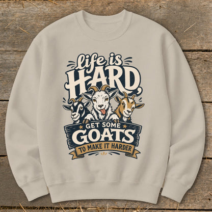 Light tan crewneck sweatshirt with "Life is HARD Get Some Goats to Make It Harder" graphic.