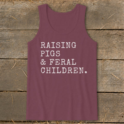 Maroon tank top with white text reading "RAISING PIGS & FERAL CHILDREN."