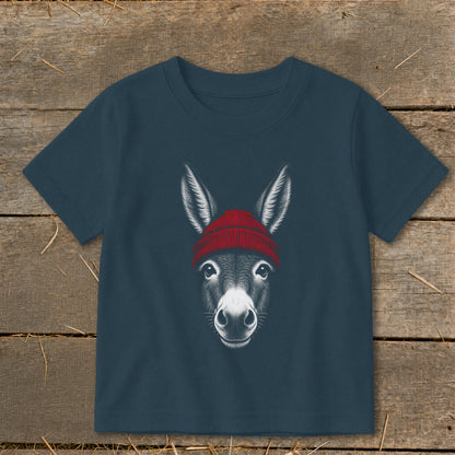 Dark blue short-sleeve children's t-shirt featuring a graphic illustration of a donkey wearing a red winter beanie.