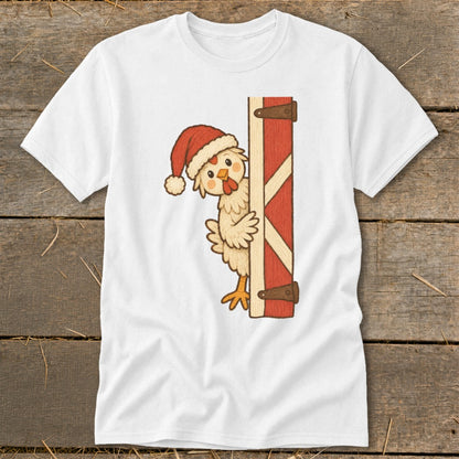 Cartoon chicken wearing a Santa hat peeks from behind a red barn door.