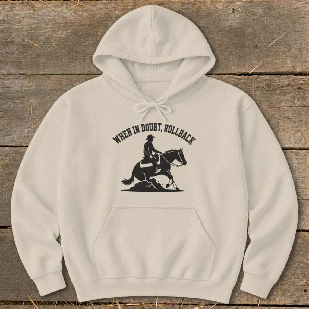 Cream hoodie with "When in doubt, rollback" text and horse rider graphic.