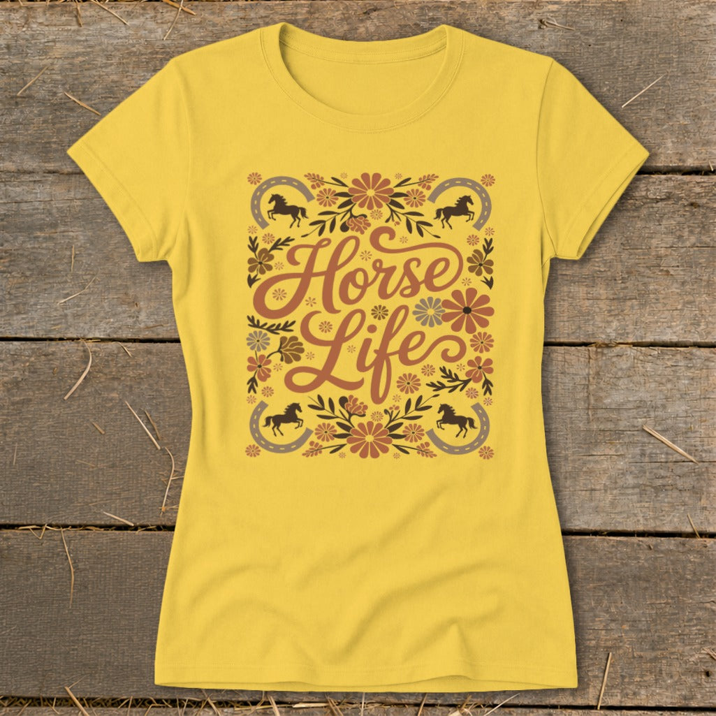 Yellow t-shirt with "Horse Life" text, horses, horseshoes, and floral design.
