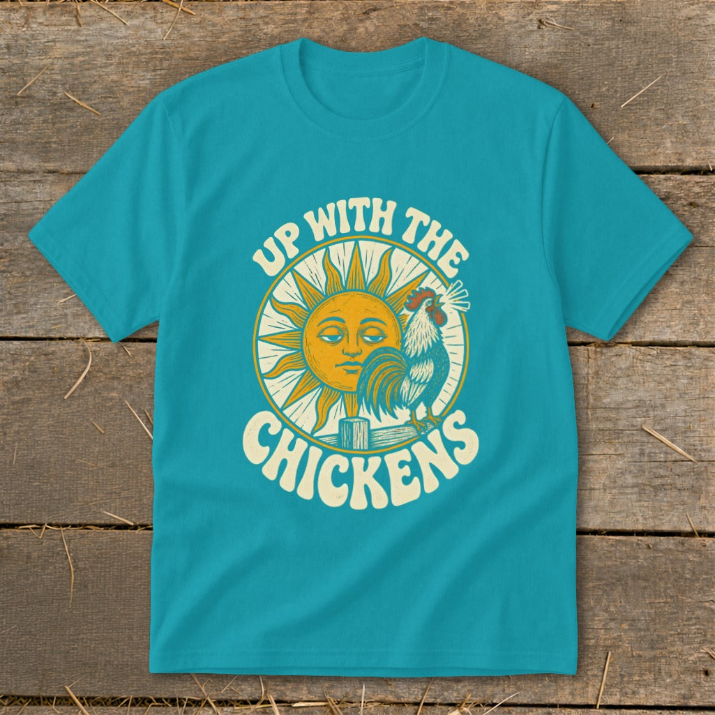 Turquoise t-shirt featuring a retro graphic of a crowing rooster and sun with the text UP WITH THE CHICKENS.