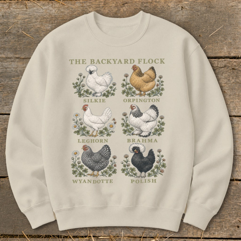 Cream sweatshirt with illustrations of six chicken breeds and the text "The Backyard Flock".