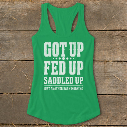 Green tank top with white text: "GOT UP FED UP SADDLED UP JUST ANOTHER BARN MORNING".