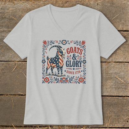 Goats & Glory Since 1776 graphic on a light grey v-neck t-shirt.