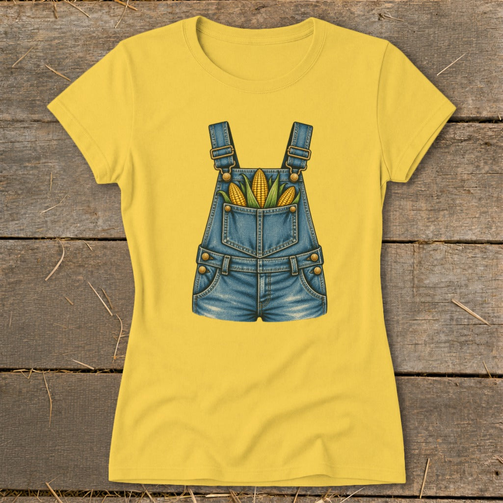Yellow t-shirt with a graphic of denim overalls filled with corn cobs.