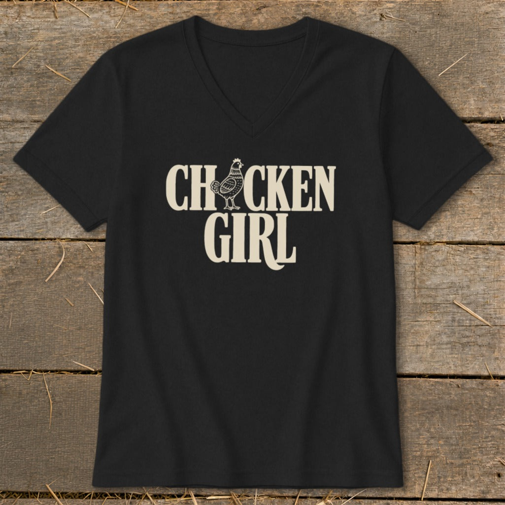 Black t-shirt with white text "CHICKEN GIRL" and a small chicken illustration.