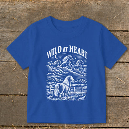 Blue t-shirt with "WILD AT HEART" text and horse graphic.