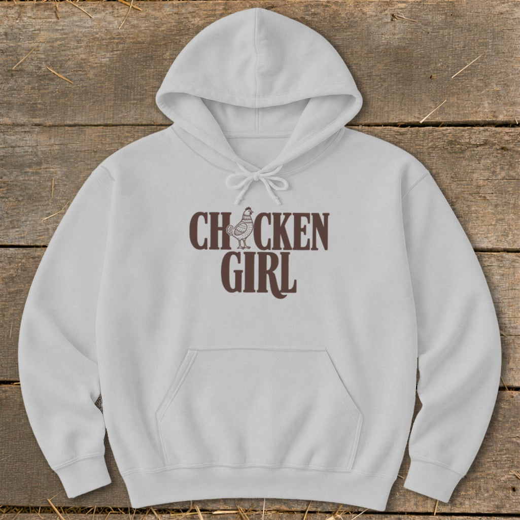 White hooded sweatshirt with "CHICKEN GIRL" text and a chicken graphic.