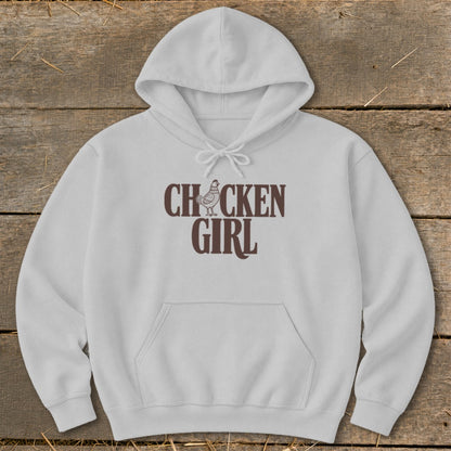 White hooded sweatshirt with "CHICKEN GIRL" text and a chicken graphic.