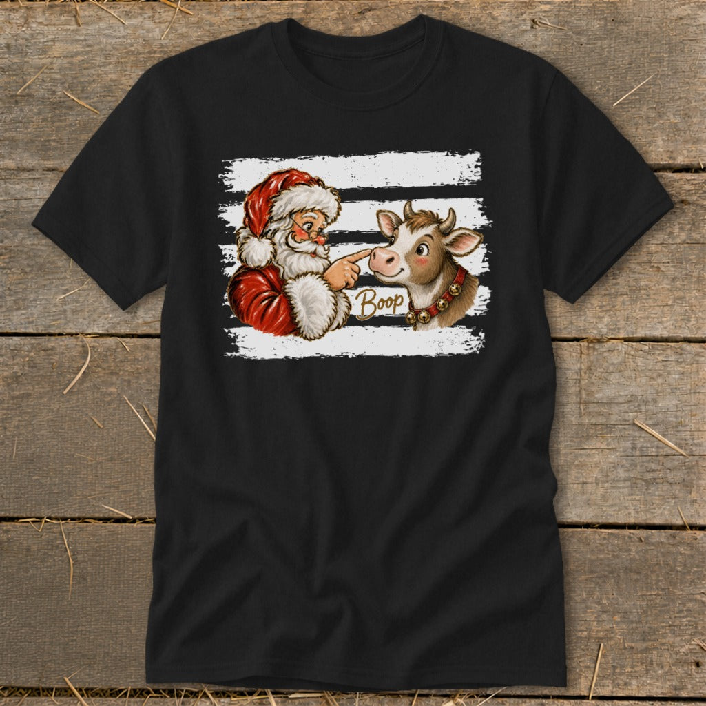 Santa boops a cow with the word "Boop" printed below.