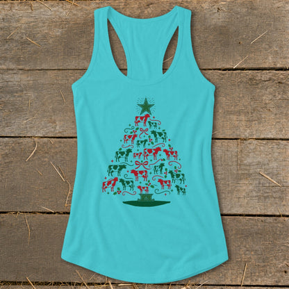 Teal tank top with a Christmas tree made of red and green cows and holly.