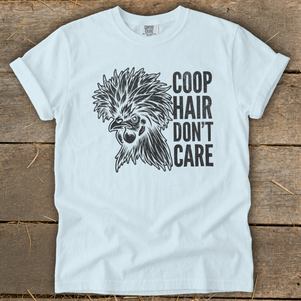 Light blue t-shirt with a chicken graphic and text "Coop Hair Don't Care".